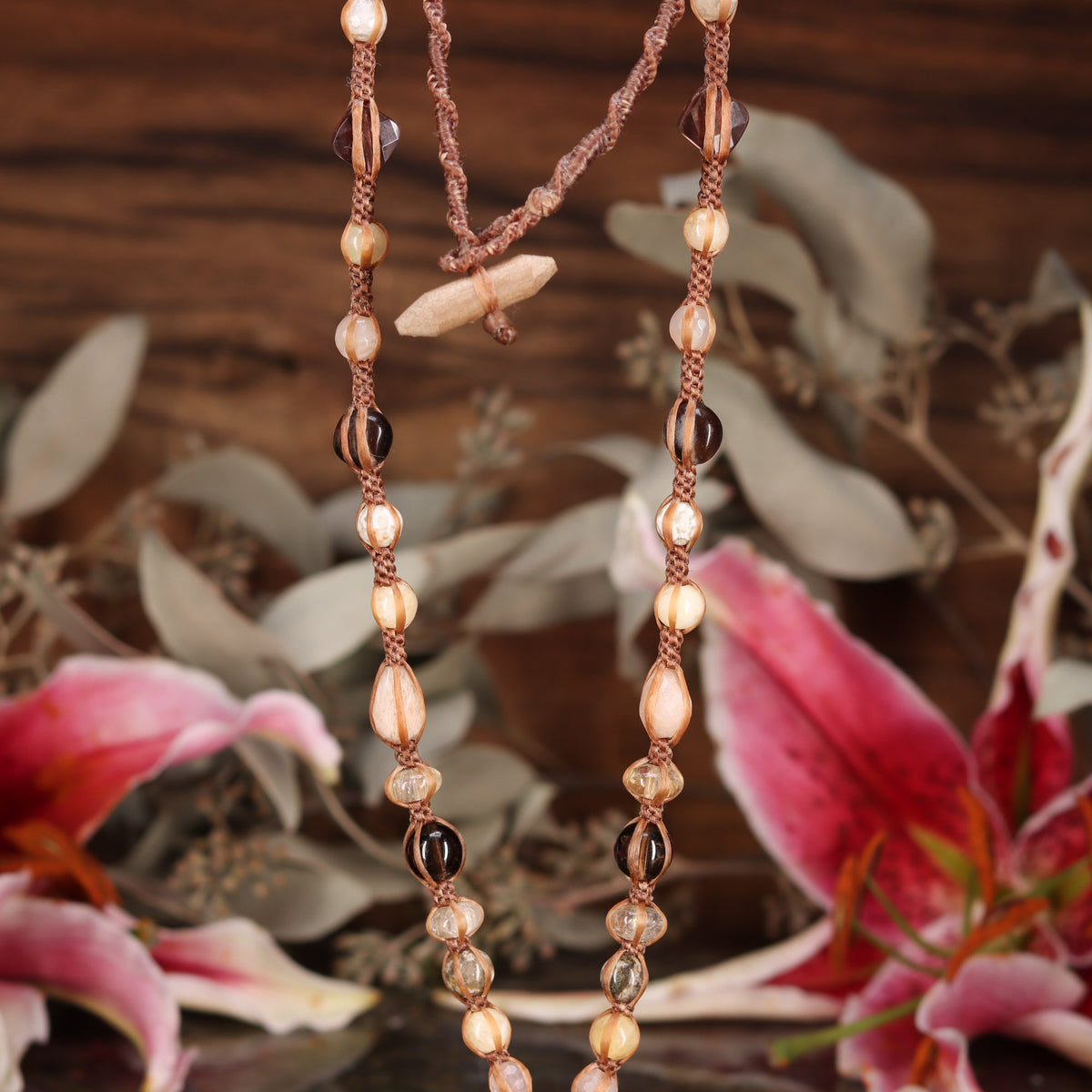 Crazy Lace Agate with Gold Merkaba Baby Sinew – Third Eye Pinecones