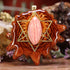 Rhodochrosite with Gold Merkaba