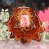 Rhodochrosite with Gold Merkaba