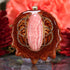 Rhodochrosite with Gold Seed of Life