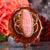 Rhodochrosite with Gold Seed of Life